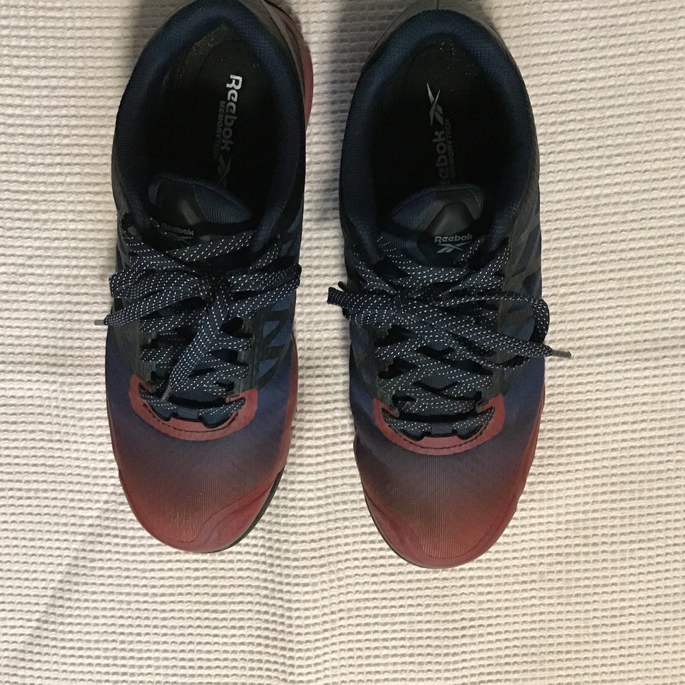 Steel toe shoes. Red & blue in color . Size 10W